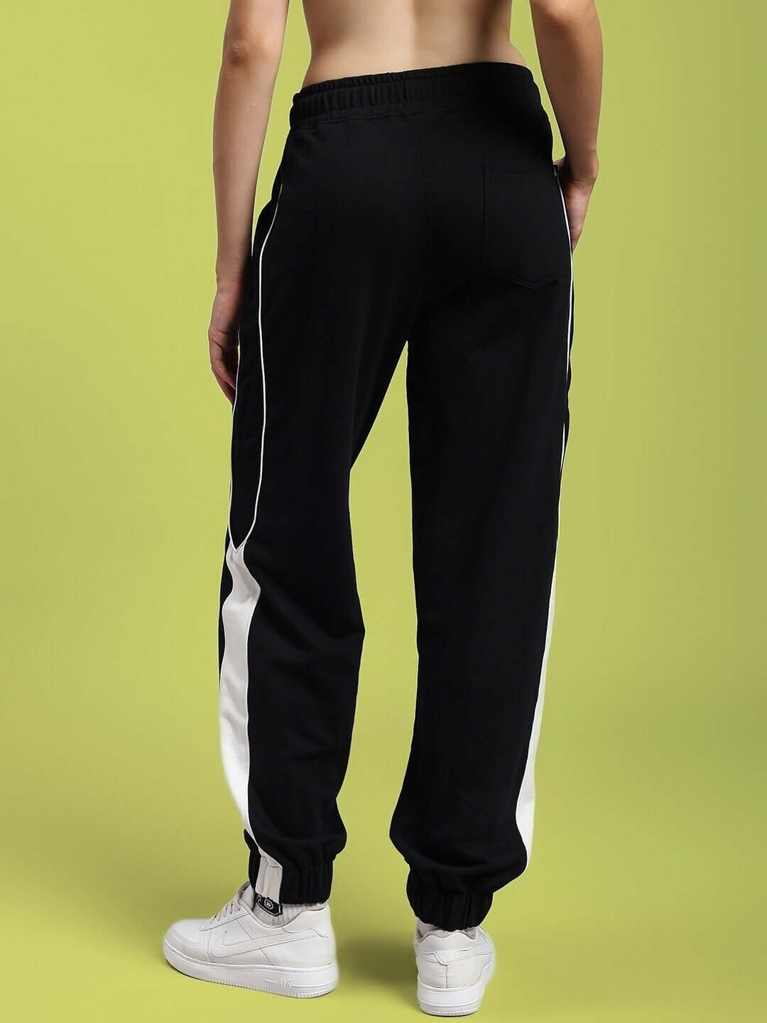 Back view of WOMENS DENVER RELAXED FIT JOGGERS BLACK featuring a stylish design and comfortable fit.