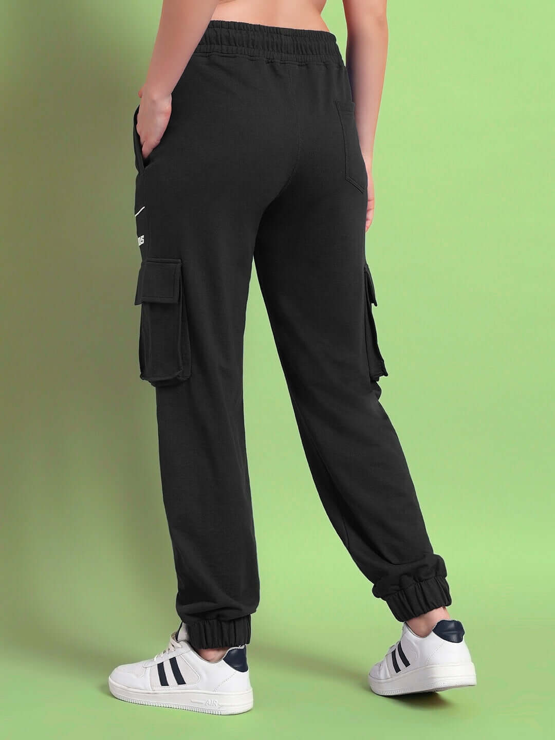 Back view of WOMENS DEVENO RELAXED-FIT JOGGERS BLACK showcasing casual style and comfort.