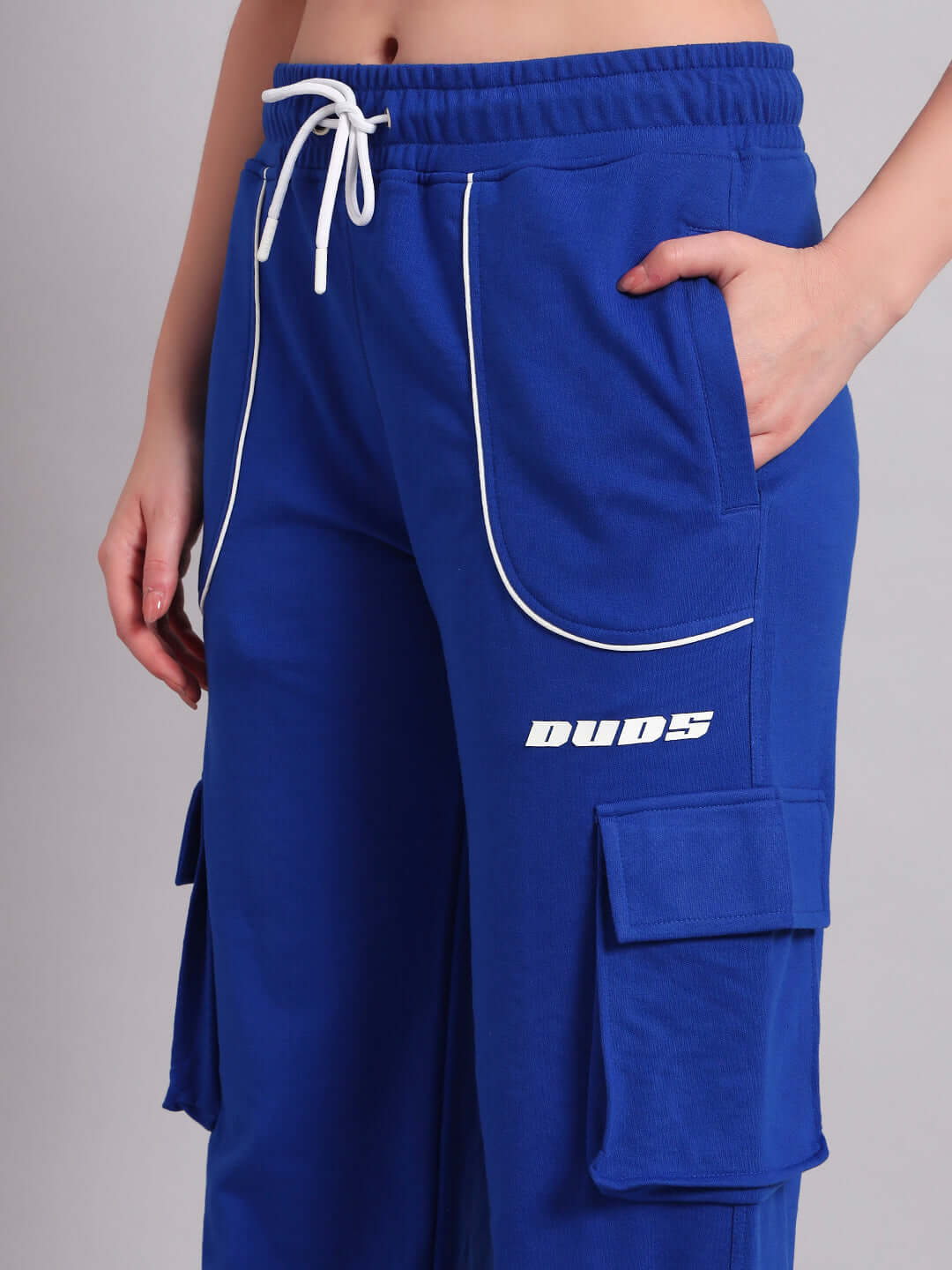 Blue women's relaxed-fit joggers by DUDS featuring pocket details and drawstring waist.