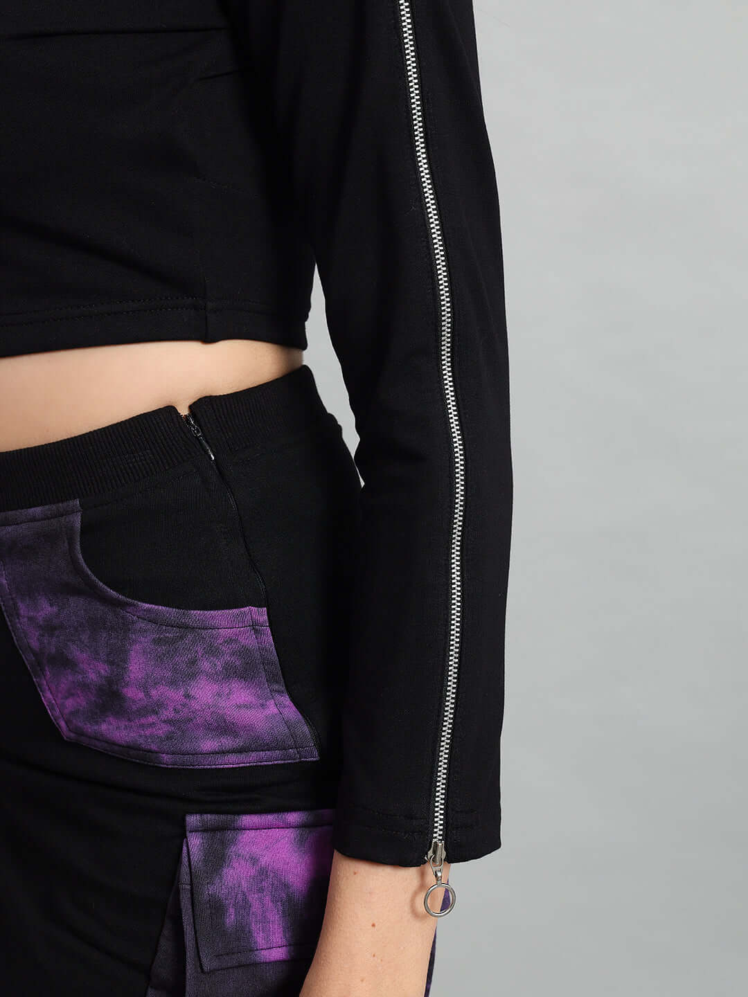 Close-up of Women's Diana Tie-Dye Crop Top in black-purple with zipper detail, made from premium cotton Lycra fabric.