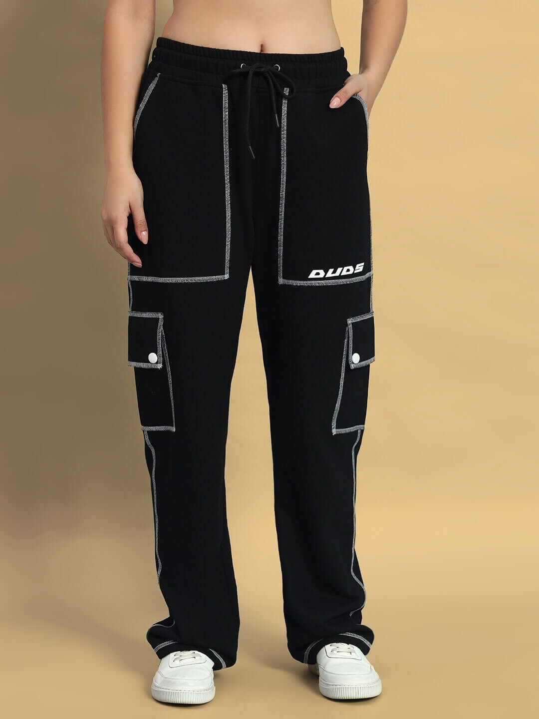 Women's dynamic oversized black co-ord set with elastic waistband, red and white contrast panel joggers, made of premium cotton.