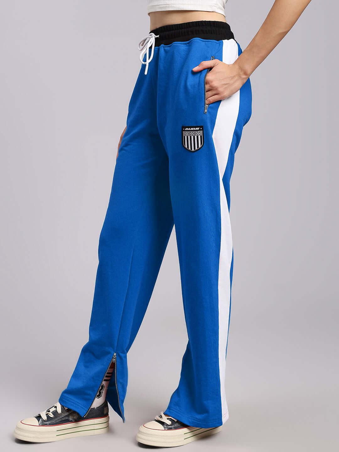 Women's elegant blue relaxed-fit joggers with white stripes, featuring custom fit option, stylish and comfortable fashion.