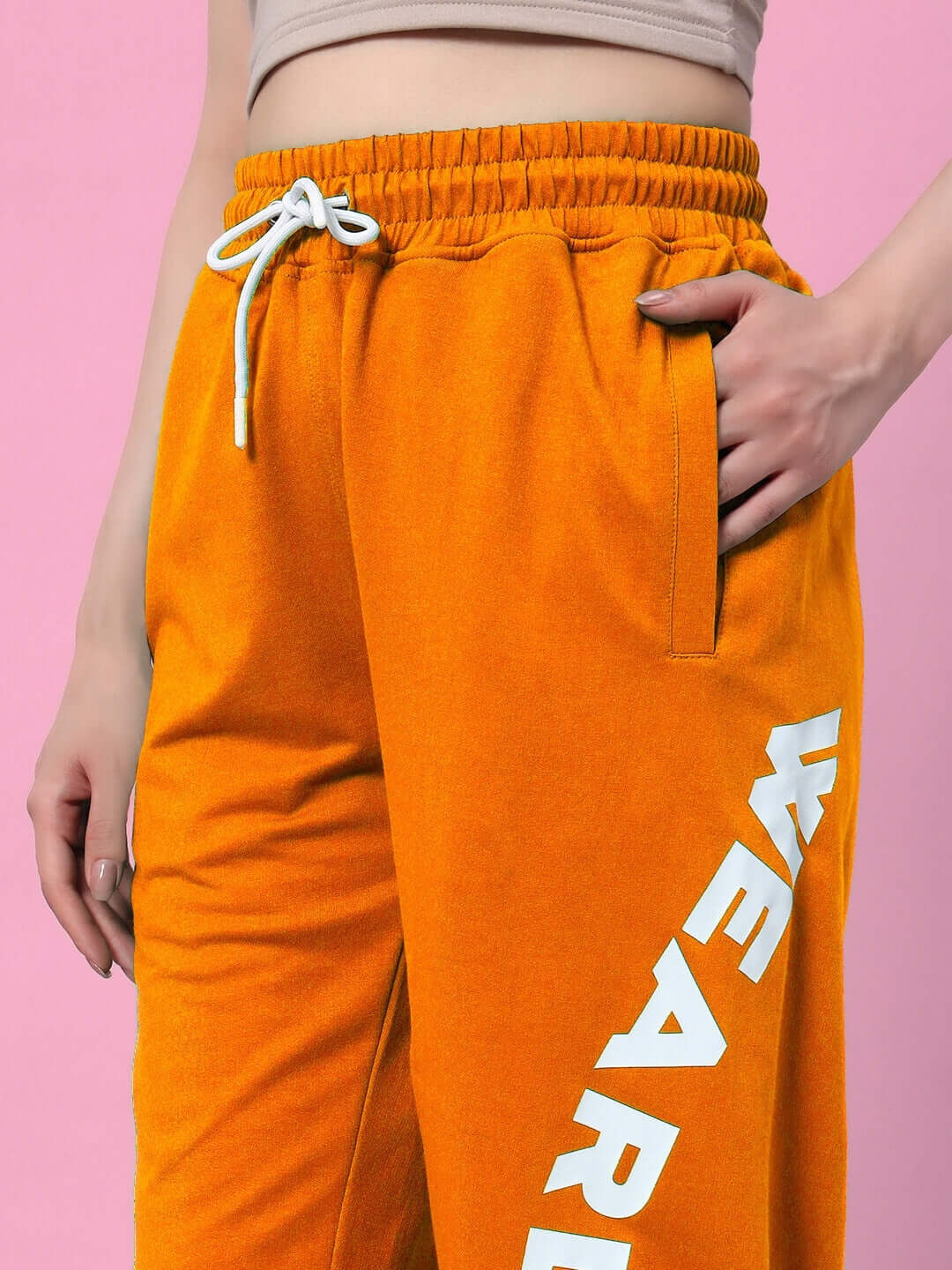 Close-up of WOMEN'S ELLEN RELAXED FIT JOGGER ORANGE, highlighting the vibrant color and comfortable fit.