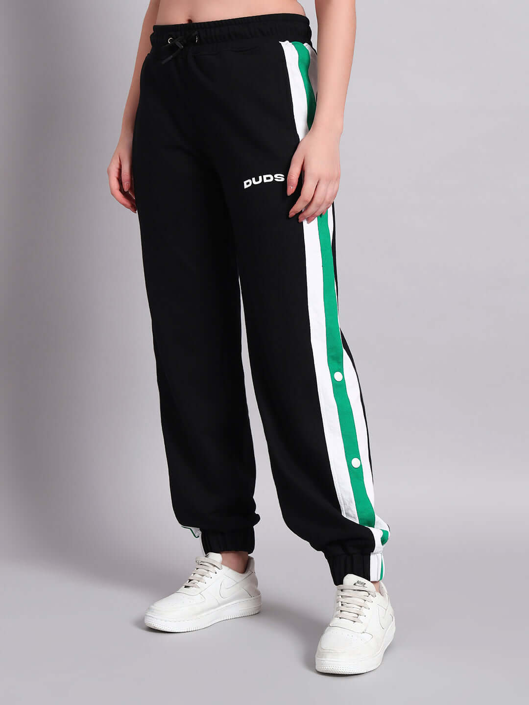 Women's Emirati Stripes Joggers in Black-Green with custom fit option, featuring white and green stripes by DUDS.