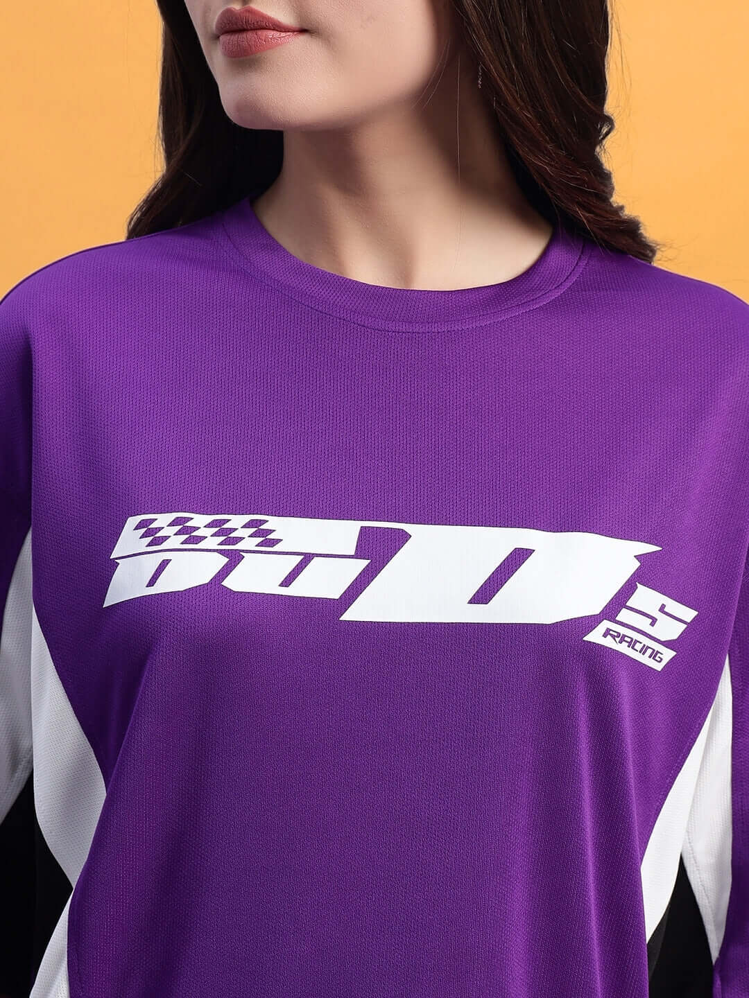Close-up of Women's FIFA Colorblock Co-Ord Set Purple top from WEAR DUDS with sporty design.
