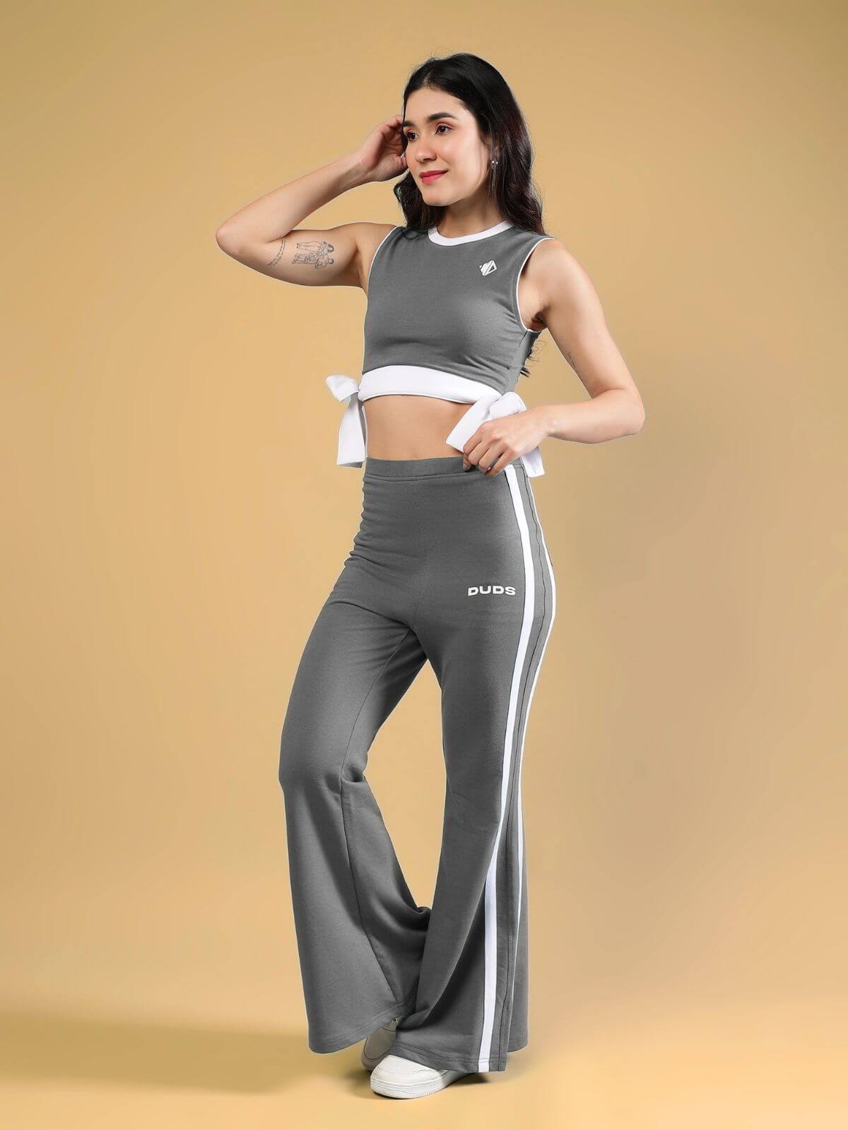 WOMENS FITTONIA COOL CO-ORD SET GREY model showcasing stylish cropped top and flared pants on a neutral background.