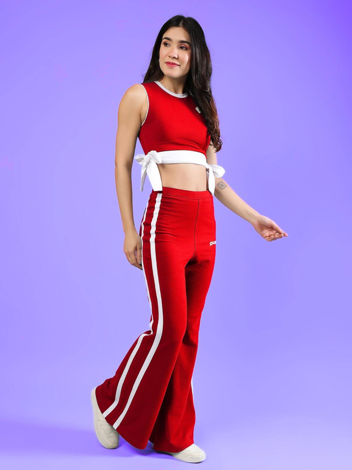 WOMENS FITTONIA COOL CO-ORD SET RED worn by model, showcasing trendy sporty-luxe style in vibrant red.