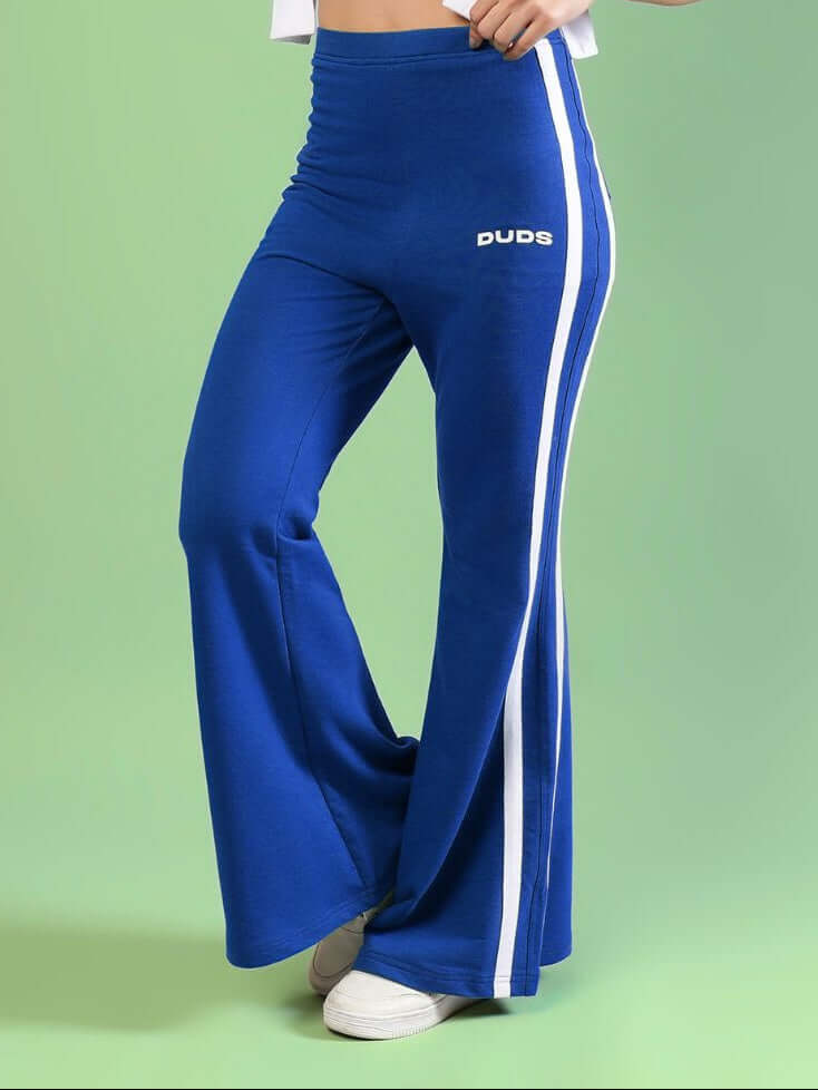 WOMENS FITTONIA COOL WIDE FLARE JOGGERS BLUE featuring a stylish wide-flare silhouette in a vibrant blue color.