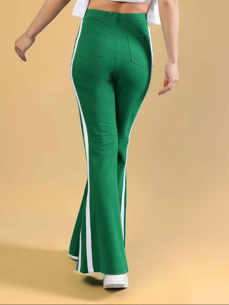 WOMENS FITTONIA COOL WIDE FLARE JOGGERS GREEN showcasing the back view, featuring a stylish wide-flare silhouette in bright green.