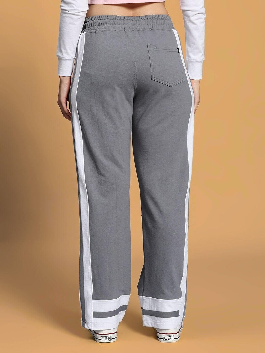 Back view of WOMEN'S FLORA CO-ORD SET PINK GREY trousers showcasing stylish design and comfort.