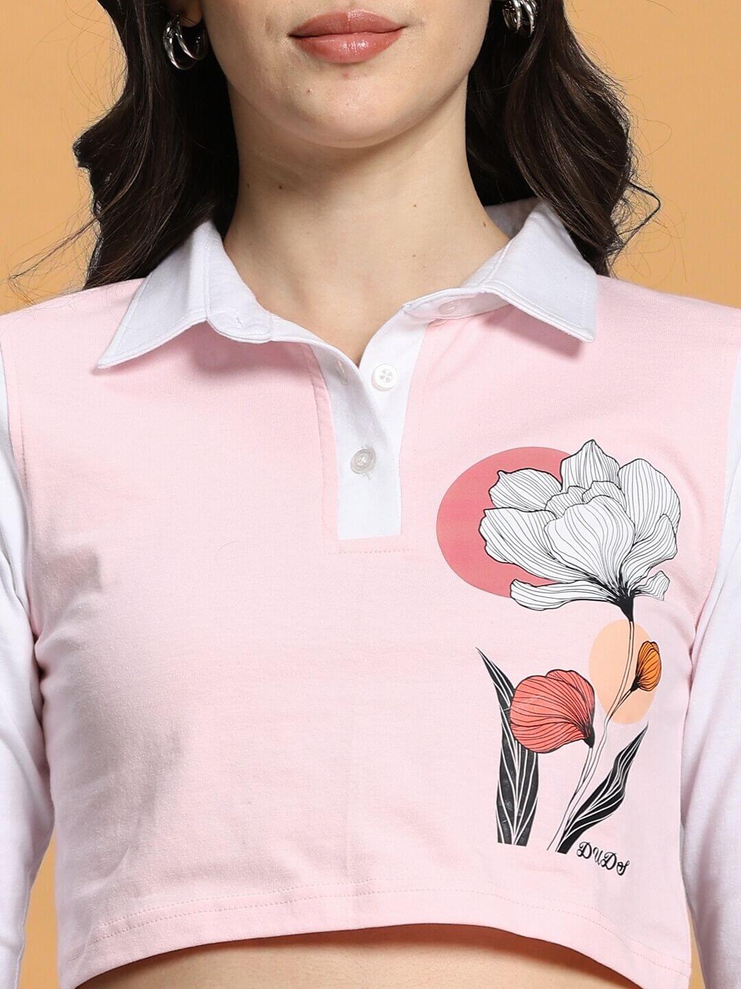 Woman wearing WOMEN'S FLORA CO-ORD SET PINK GREY with floral design on top