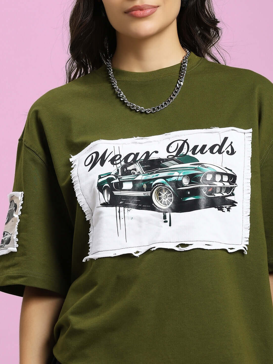 Olive green oversized women's t-shirt featuring a vintage Ford Mustang design, made from premium cotton French terry.