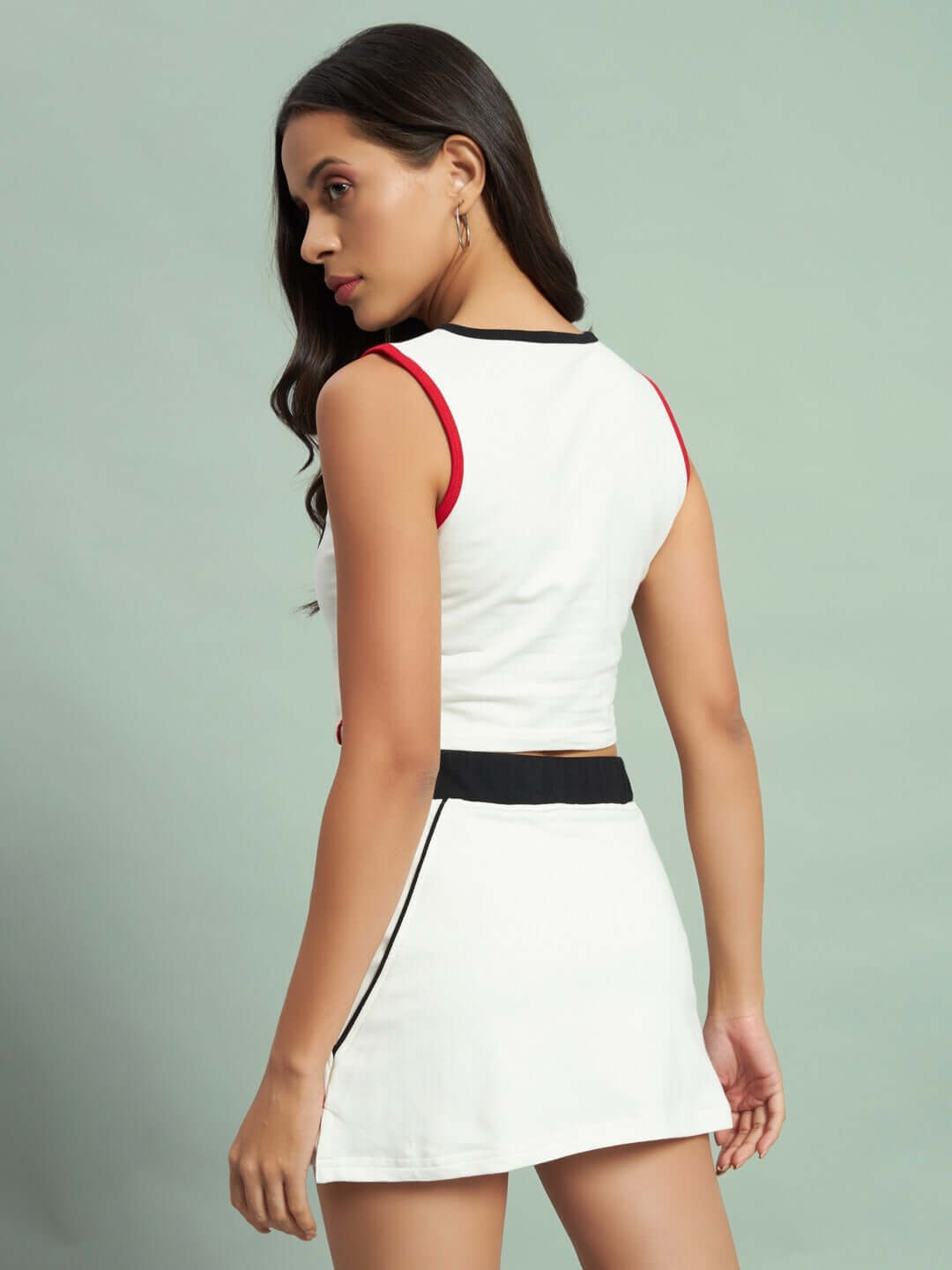 Alt Tag: Back view of a model wearing the Women's Francie Co-ord Set in off-white with red accents, made from premium cotton blend fabric.