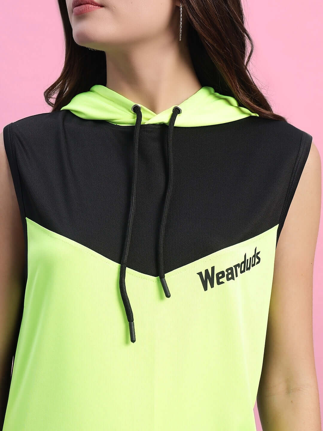 Close-up of WOMEN'S FRANKY GYM T-SHIRT NEON GREEN with hood and black accents, featuring modern sporty design.