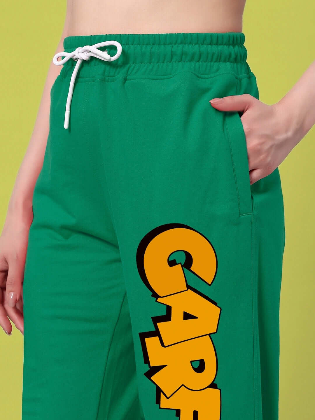 Women's Smug Garfield Relaxed Fit Jogger in green with cartoon logo, perfect for casual outings or lounging.