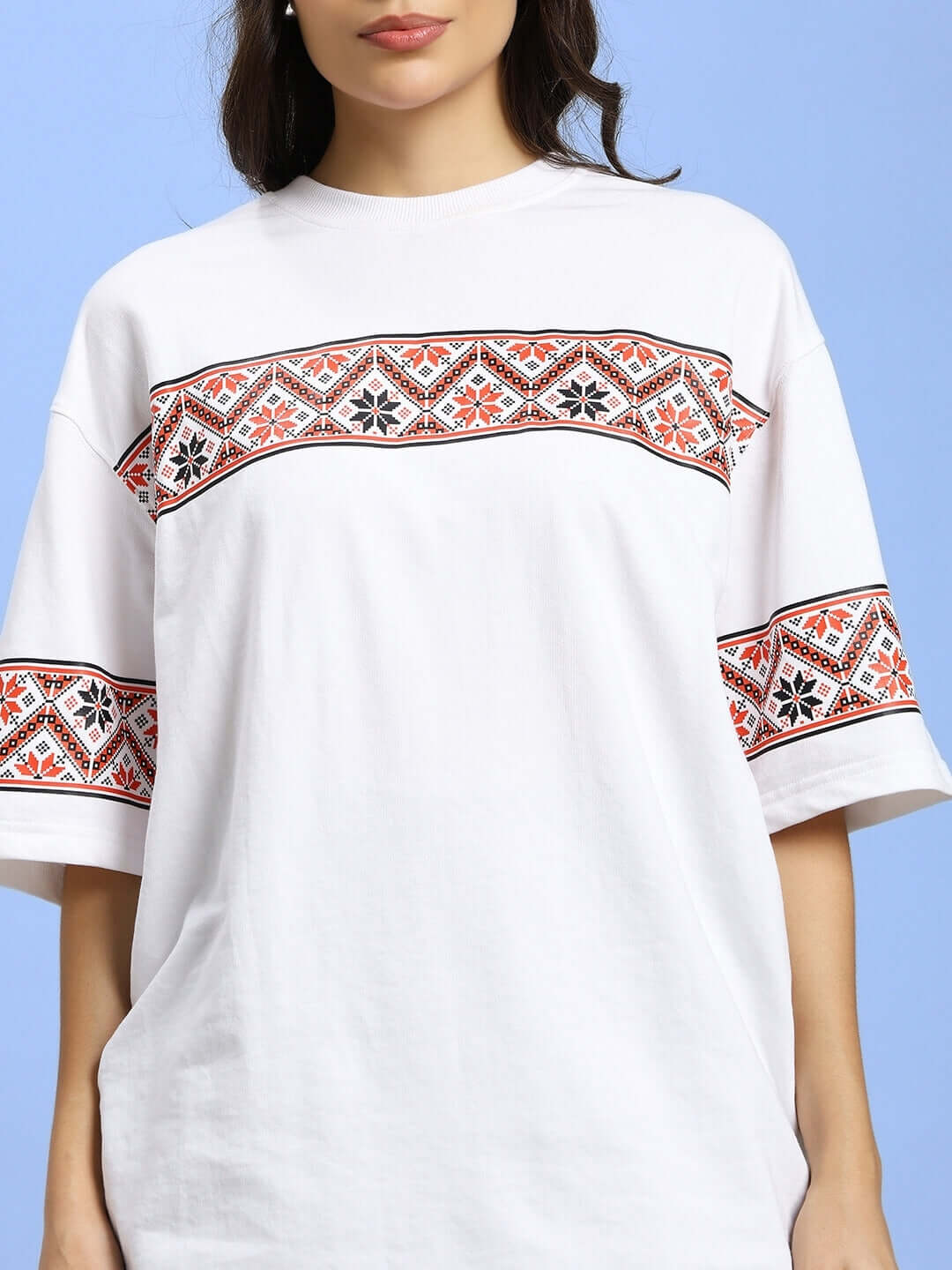 White women's t-shirt with Vyshyvanka print pattern, featuring premium cotton fabric and intricate design. Ideal for casual wear.
