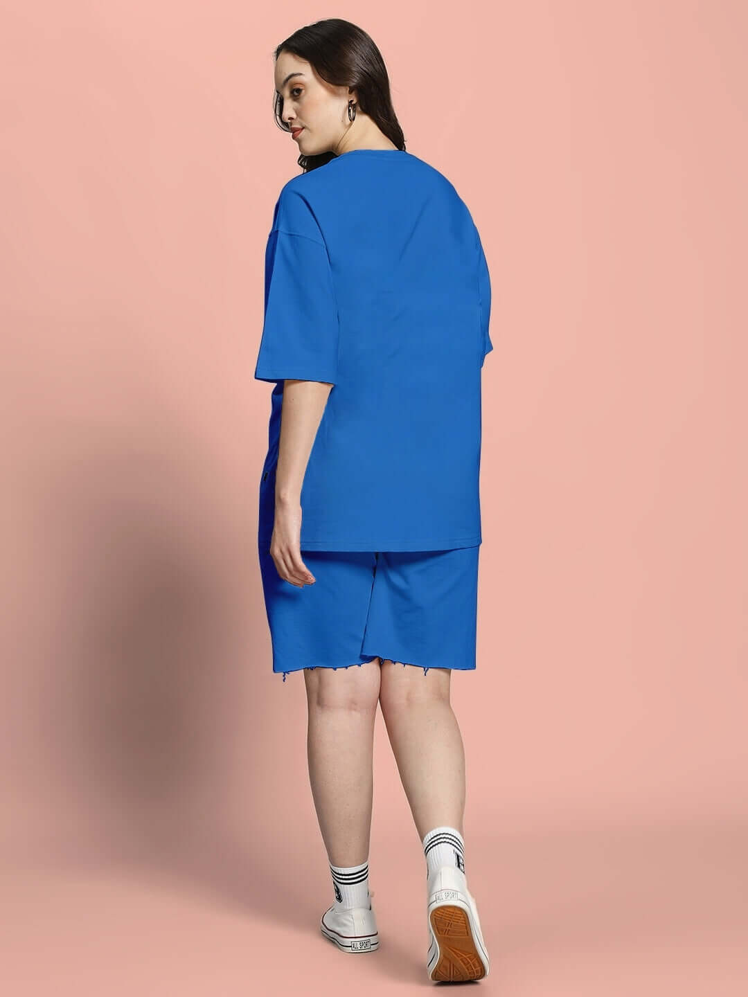 Model wearing WOMEN'S HELIANTHUS SUMMER CO-ORD SET BLUE made of premium cotton fabric
