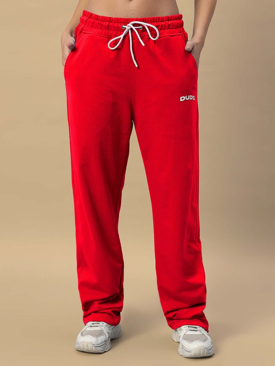 Red Hershey side slit joggers for women, designed by DUDS, featuring adjustable waistband and comfortable fit; customize for perfect size.
