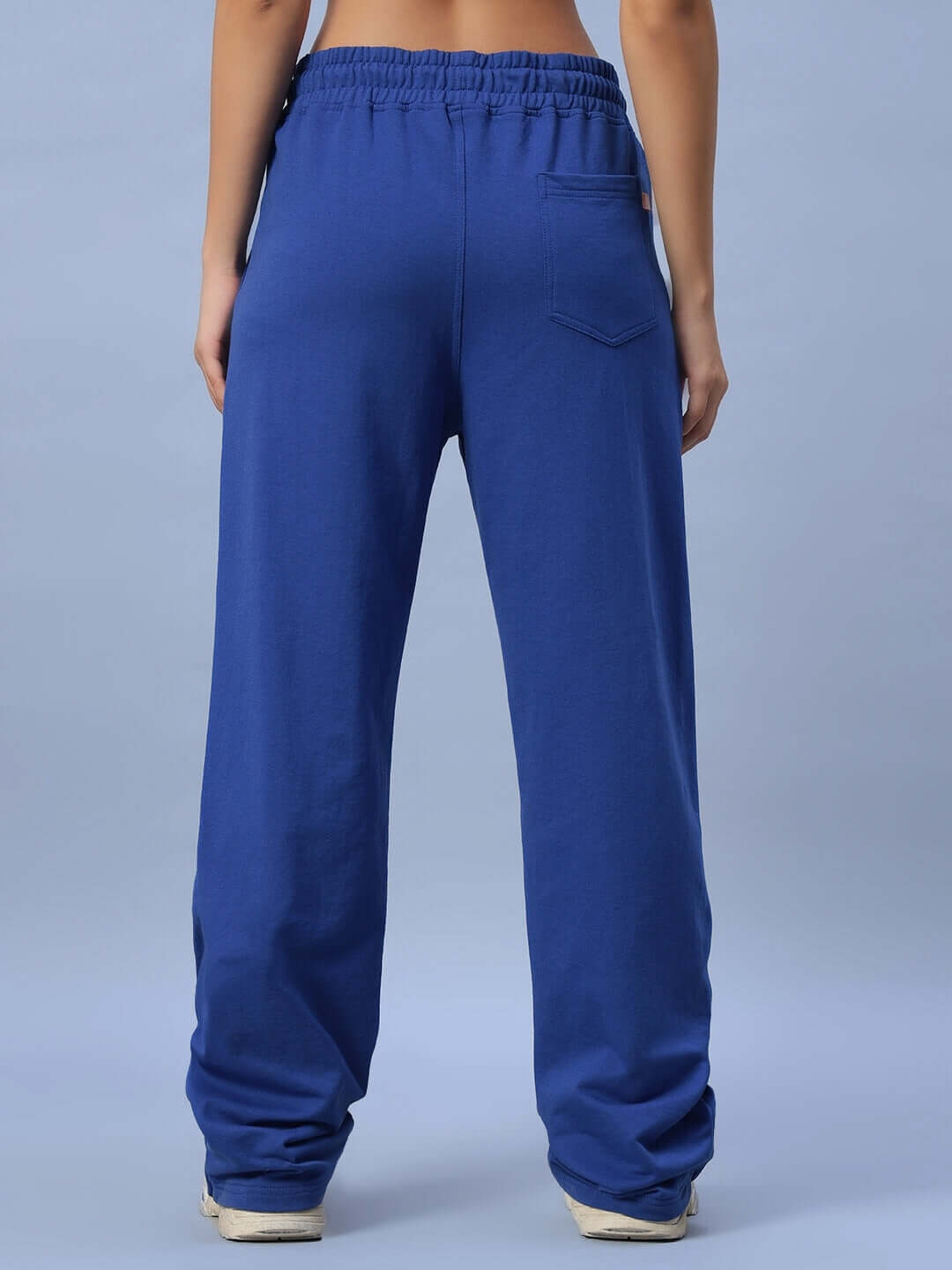 Back view of women's Hershey side slit joggers in royal blue, featuring elastic waistband and relaxed fit.