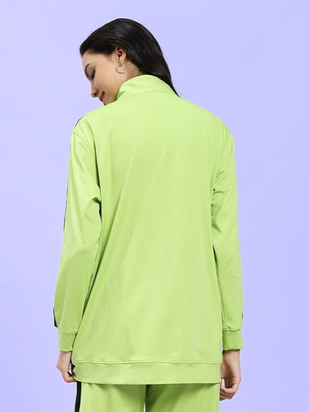 Back view of WOMEN HIGH PERFORMANCE JACKET NEON GREEN on a model showing vibrant color and sleek design.