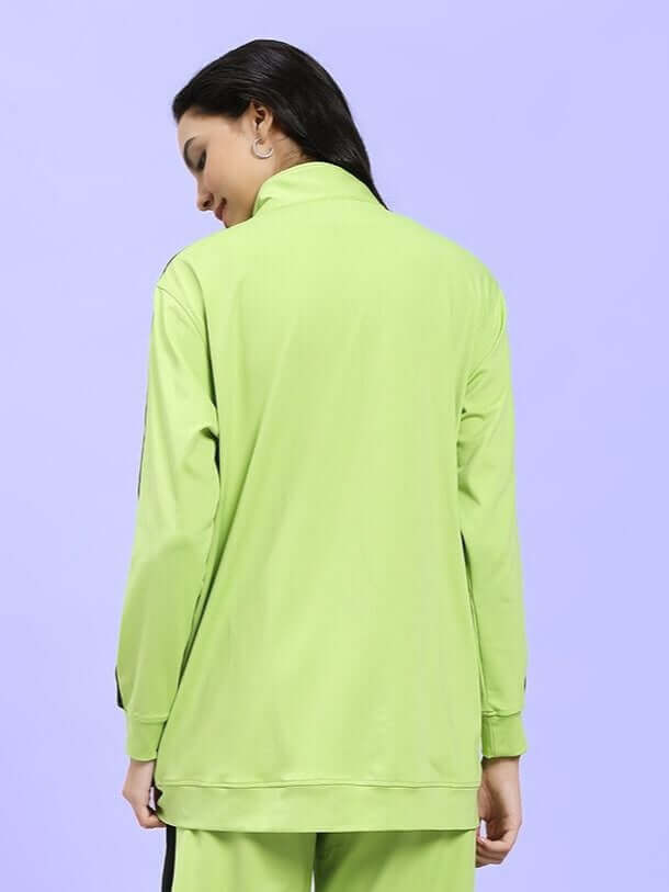 Back view of WOMEN HIGH PERFORMANCE JACKET NEON GREEN on a model showing vibrant color and sleek design.