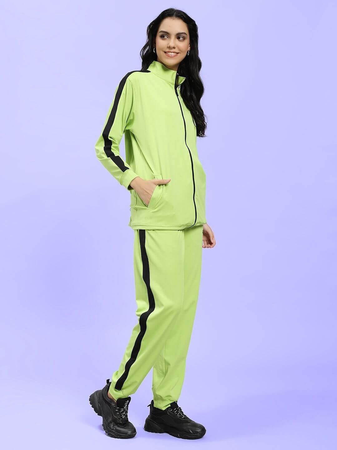 Model wearing WOMEN HIGH PERFORMANCE CO-ORD SET NEON GREEN, showcasing sporty edge and street-chic flair with premium performance fabric.