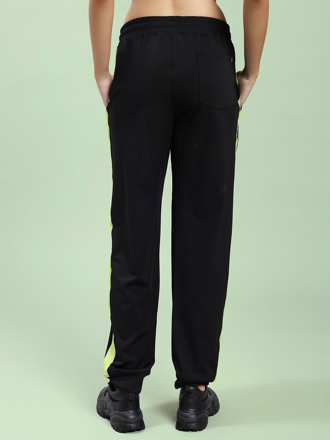 Back view of WOMEN'S HIGH PERFORMANCE RELAXED FIT JOGGER BLACK showing relaxed fit and style.