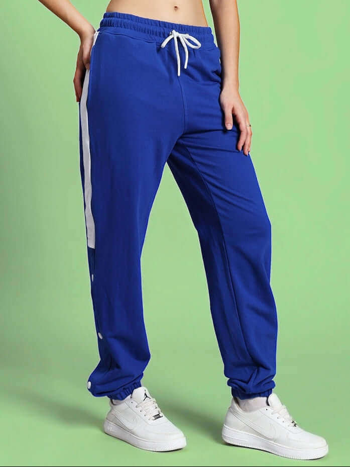 Women's high point contrast joggers in royal blue, featuring a comfortable fit and white side stripes, available for custom sizing.