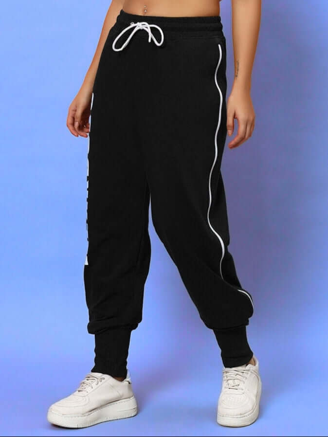Women's black joggers from DUDS with a classic design, adjustable waistband, and stylish fit. Customizable size options available.