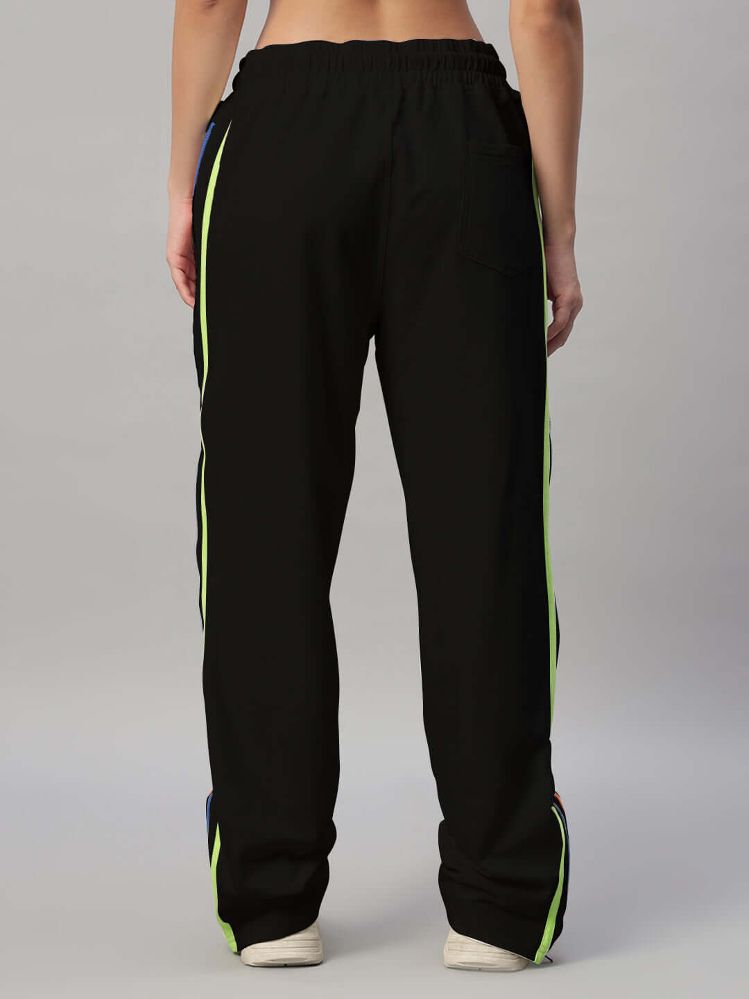 Back view of WOMEN'S IMPERIAL SIDE ZIPPER JOGGERS BLACK with side stripes, showcasing custom fit design options for tailored comfort.