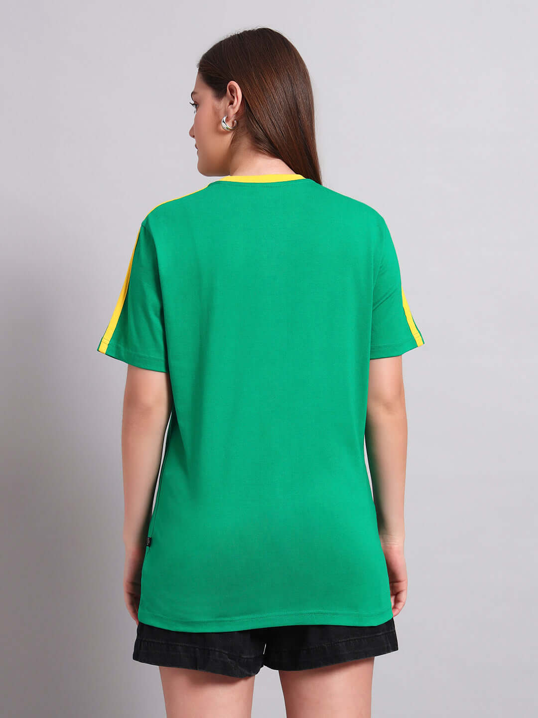 Back view of a woman wearing a green Irish regular fit T-shirt with yellow stripes, made of 100% cotton. Manufactured in India.