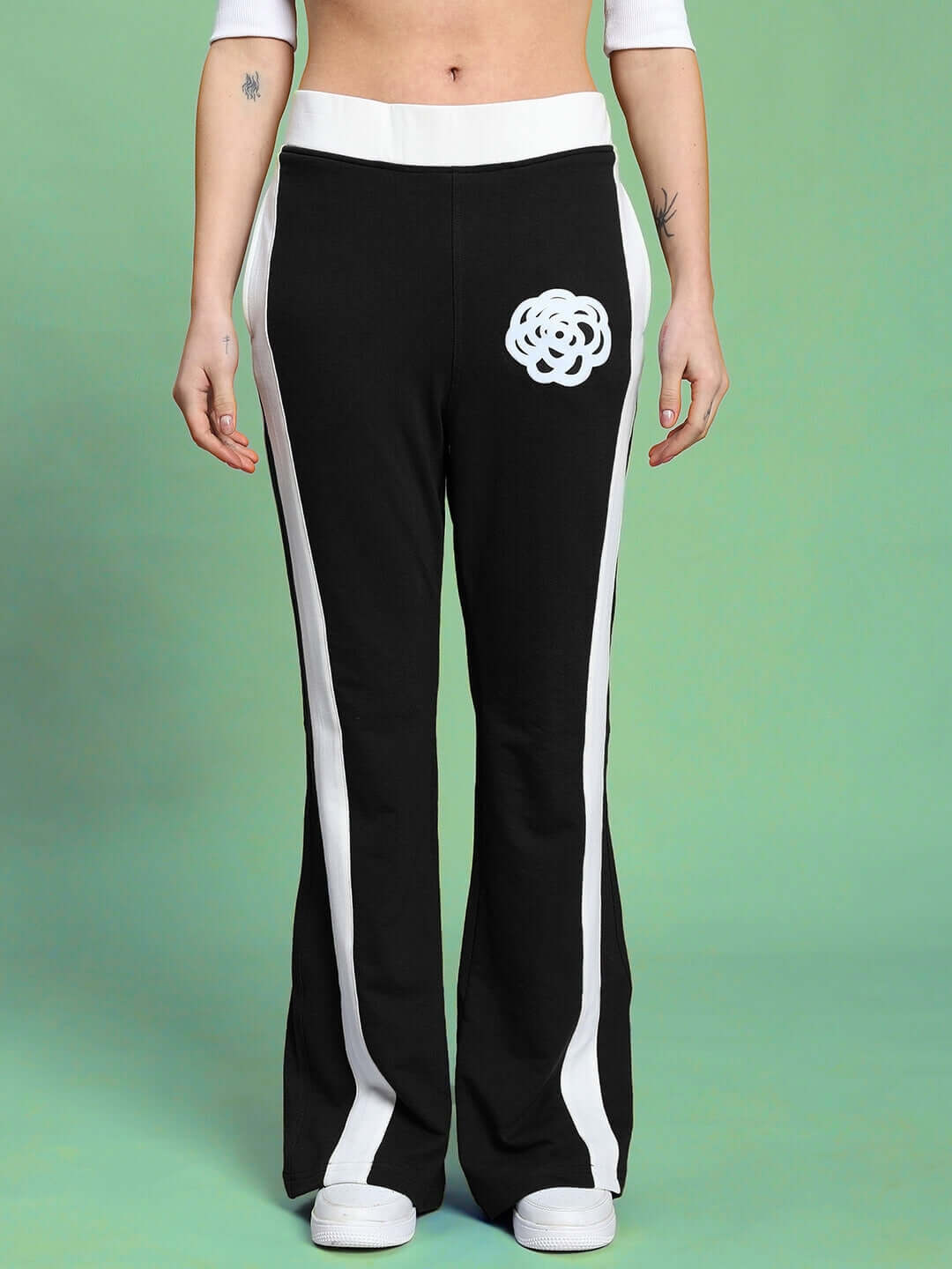 Front view of Women's Jessflick Relaxed Fit Co-ord Set Black showcasing pants with stylish white stripe detailing.
