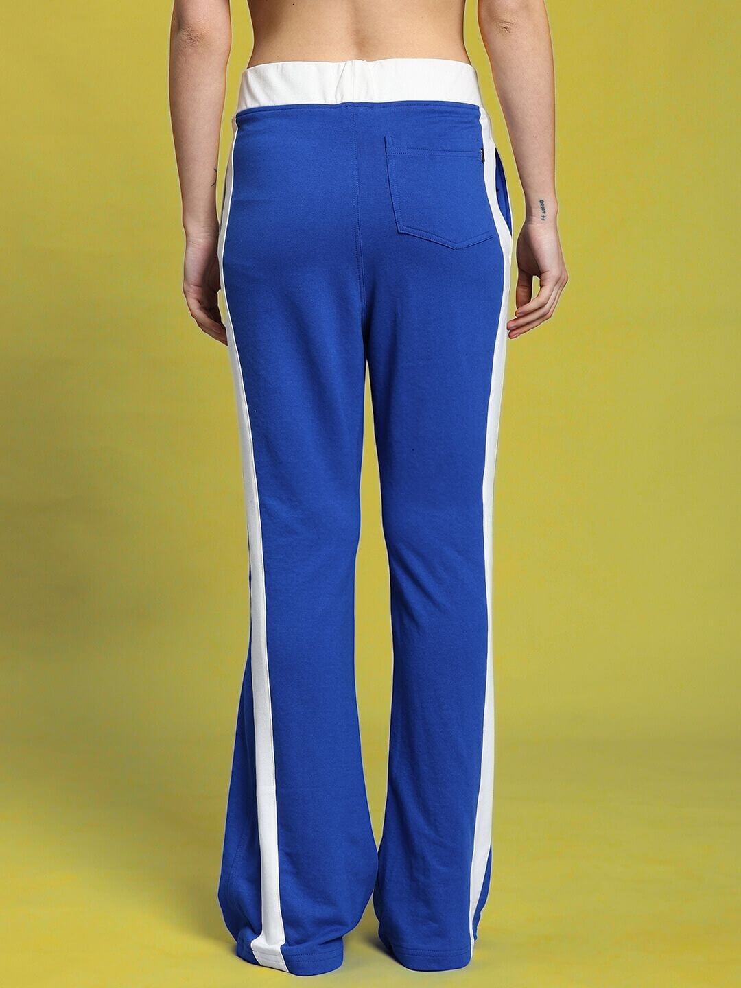 Back view of royal blue women's relaxed fit co-ord set with white contrast panel and elasticated waistband.