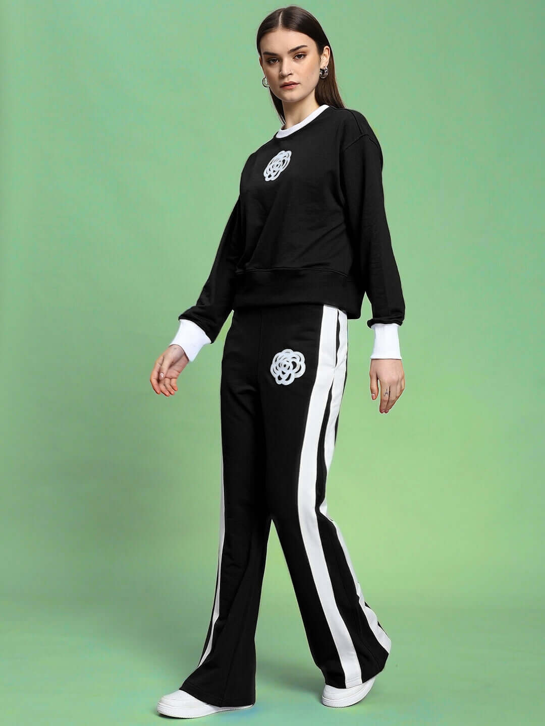 Model wearing WOMEN'S JESSFLICK RELAXED FIT CO-ORD SET BLACK streetwear outfit.