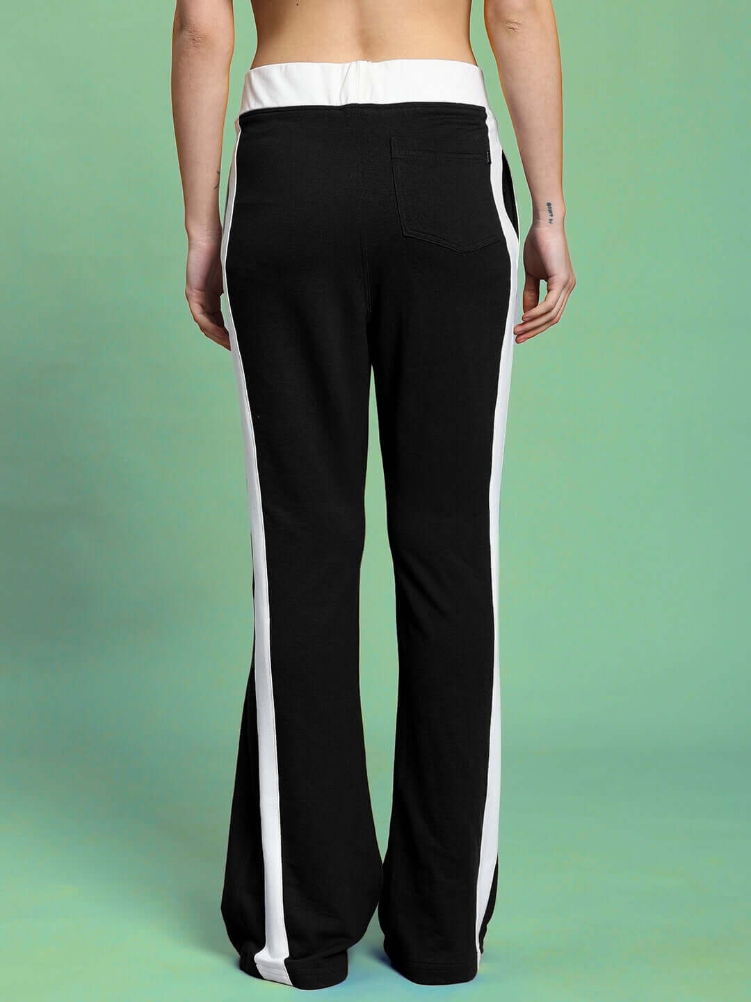 Back view of Women's Jessflick Relaxed Fit Jogger in black-white, showcasing the comfortable design and stylish contrast stripe detail.