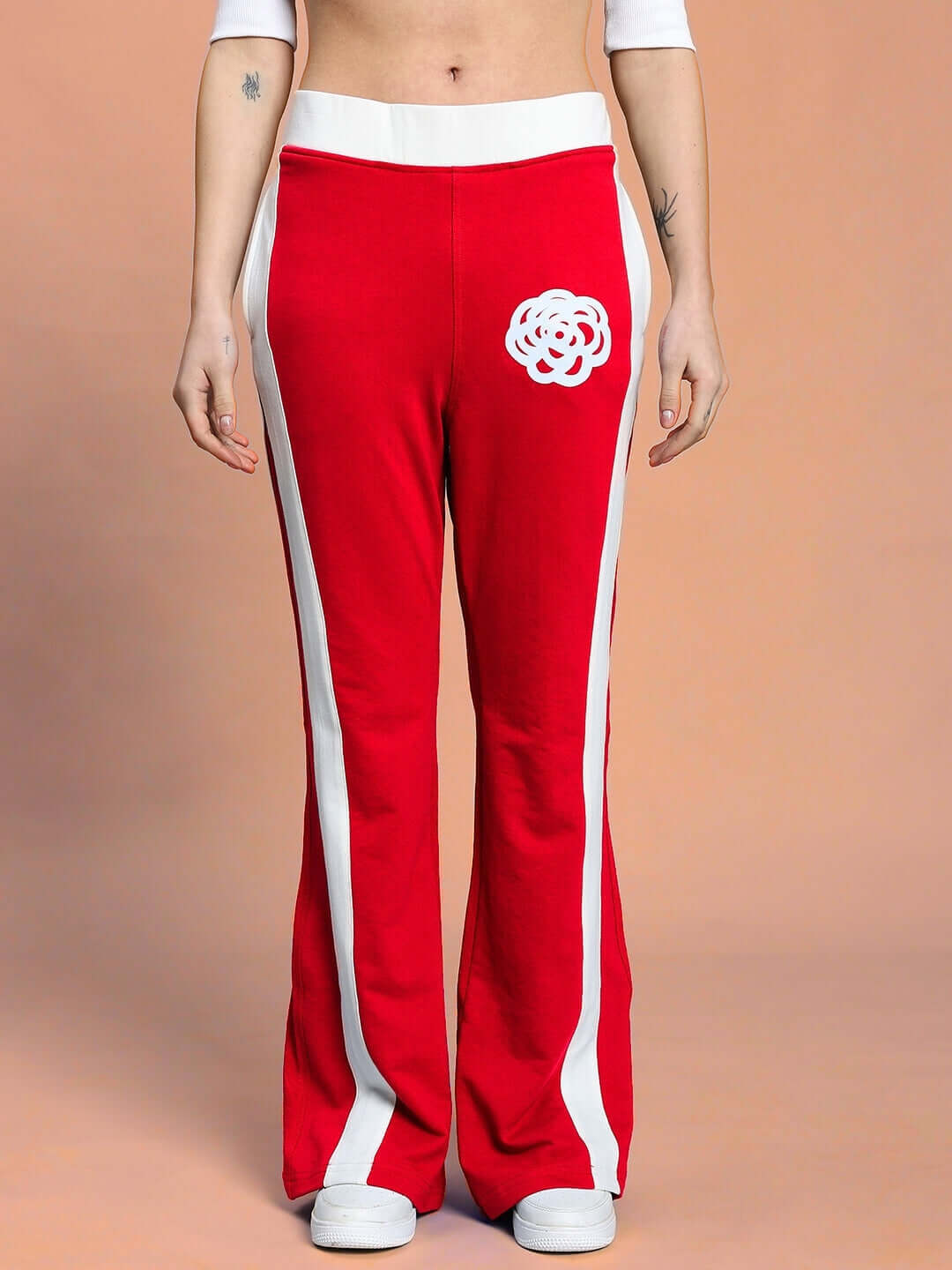 Front view of WOMEN'S JESSFLICK RELAXED FIT CO-ORD SET RED with white side stripes