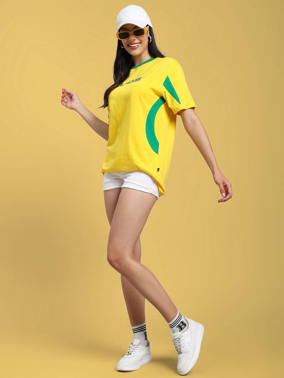 Model wearing yellow-green Women's Jumpy Regular Fit T-shirt, showcasing stylish eco-friendly cotton design ideal for casual wear.