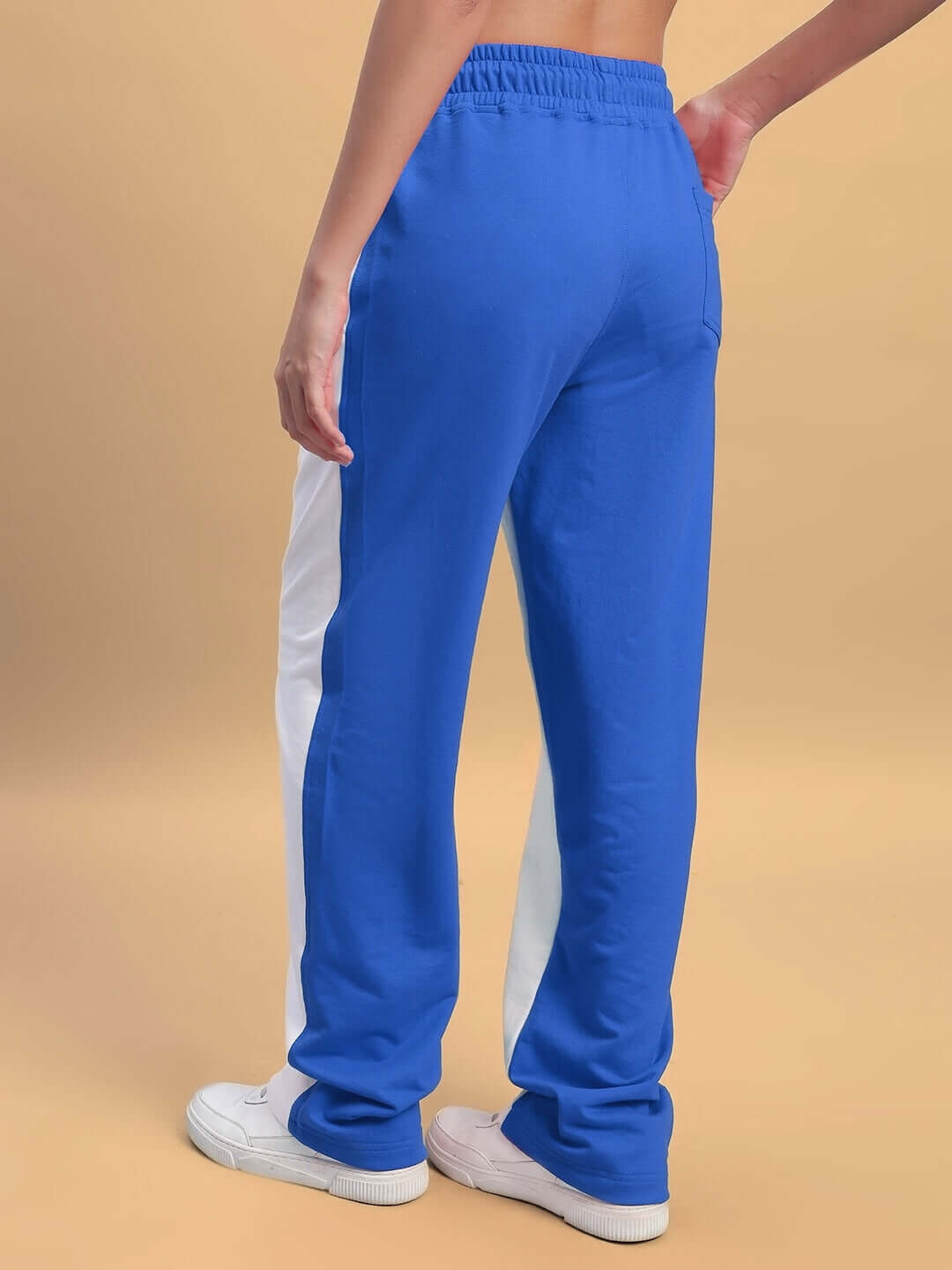 Back view of women's lagoon relaxed fit joggers in white and blue, highlighting the comfortable and stylish design.