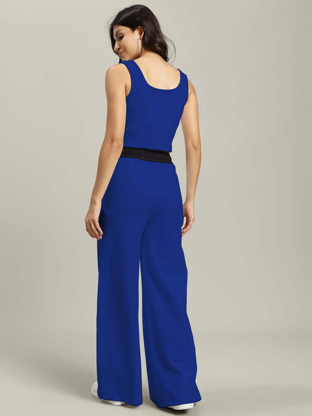 Back view of model wearing Women's Larissa Co-ord Set in royal blue and black, featuring a sleeveless top and wide-leg pants.
