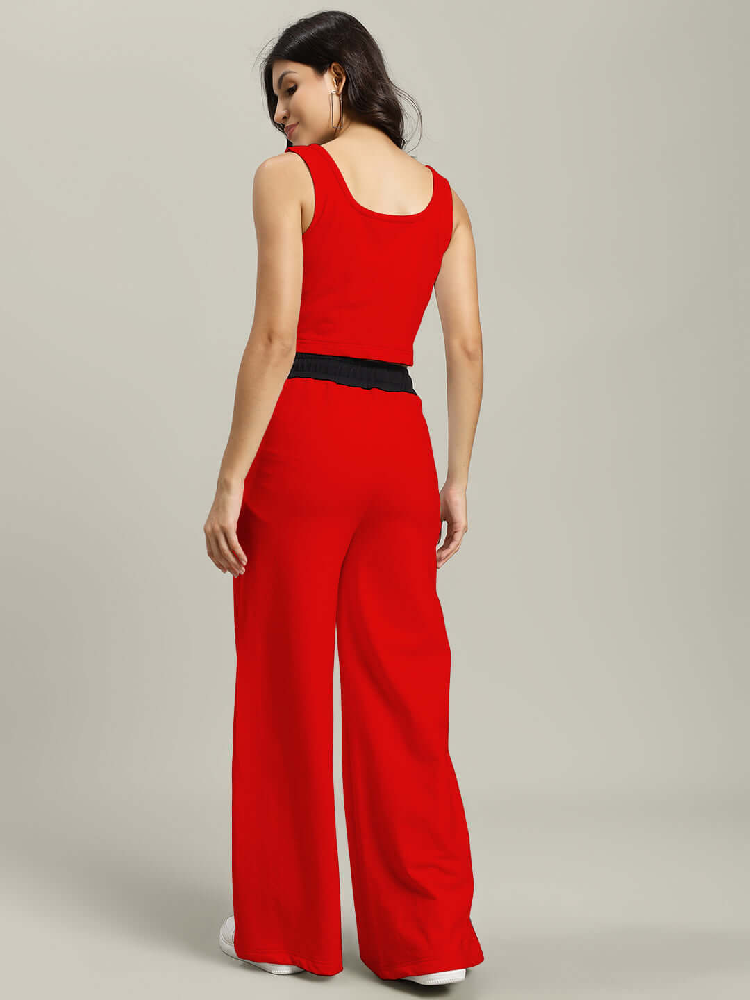 Woman wearing Women's Larissa Co-Ord Set in red-black, made of premium heavy gauge fabric, 97% cotton, showcased from the back.