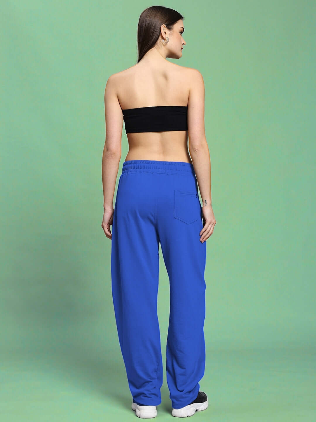 Back view of model wearing WOMEN'S LIA CO-ORD SET BLACK ROYAL BLUE, showcasing bold and elegant streetwear style.