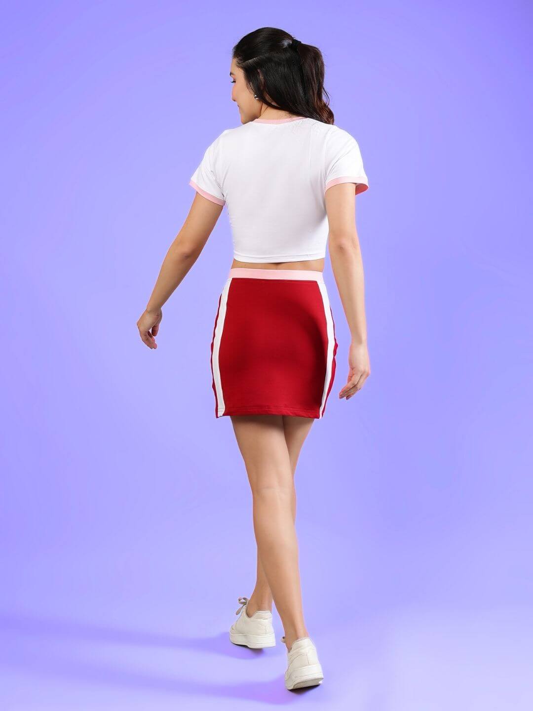 Back view of model wearing WOMEN'S LIBI HEART ACTIVE CO-ORD SET WHITE-RED with sporty design from WEAR DUDS.