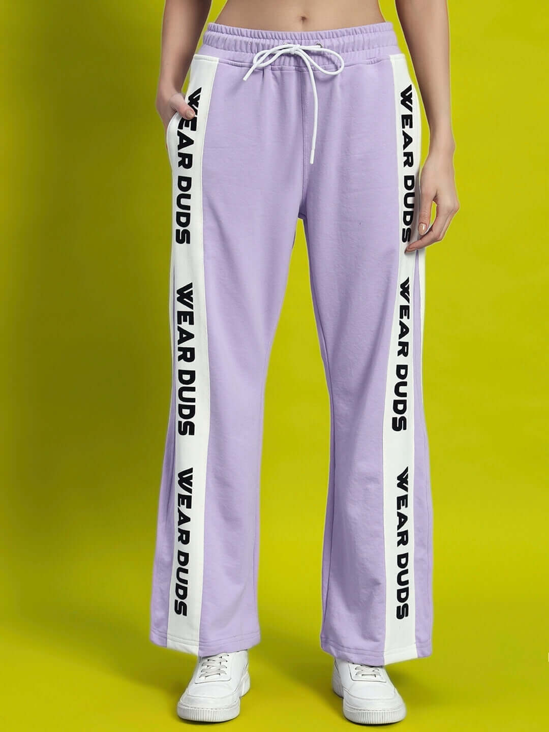 Women's lilac aroma joggers with elasticated waistband, relaxed fit, premium cotton fabric, and "WEAR DUDS" side print.