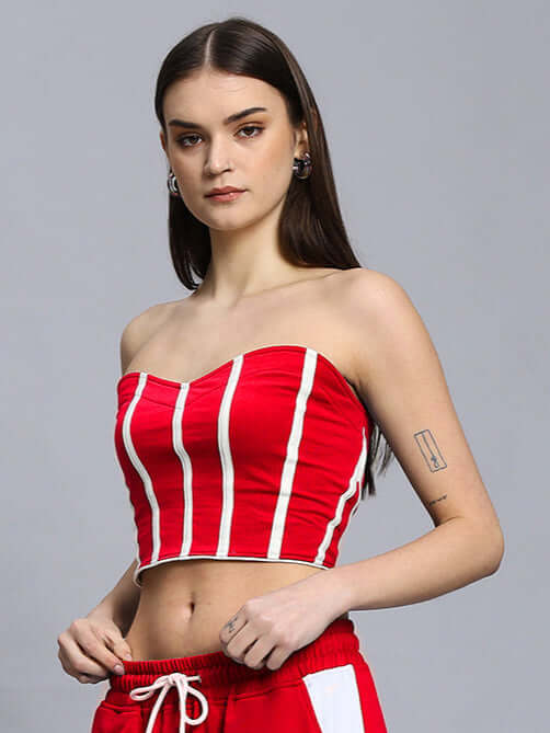 Woman wearing red Liviana cool bandeau top made from premium 100% cotton fabric; stylish and comfortable for summer fashion.