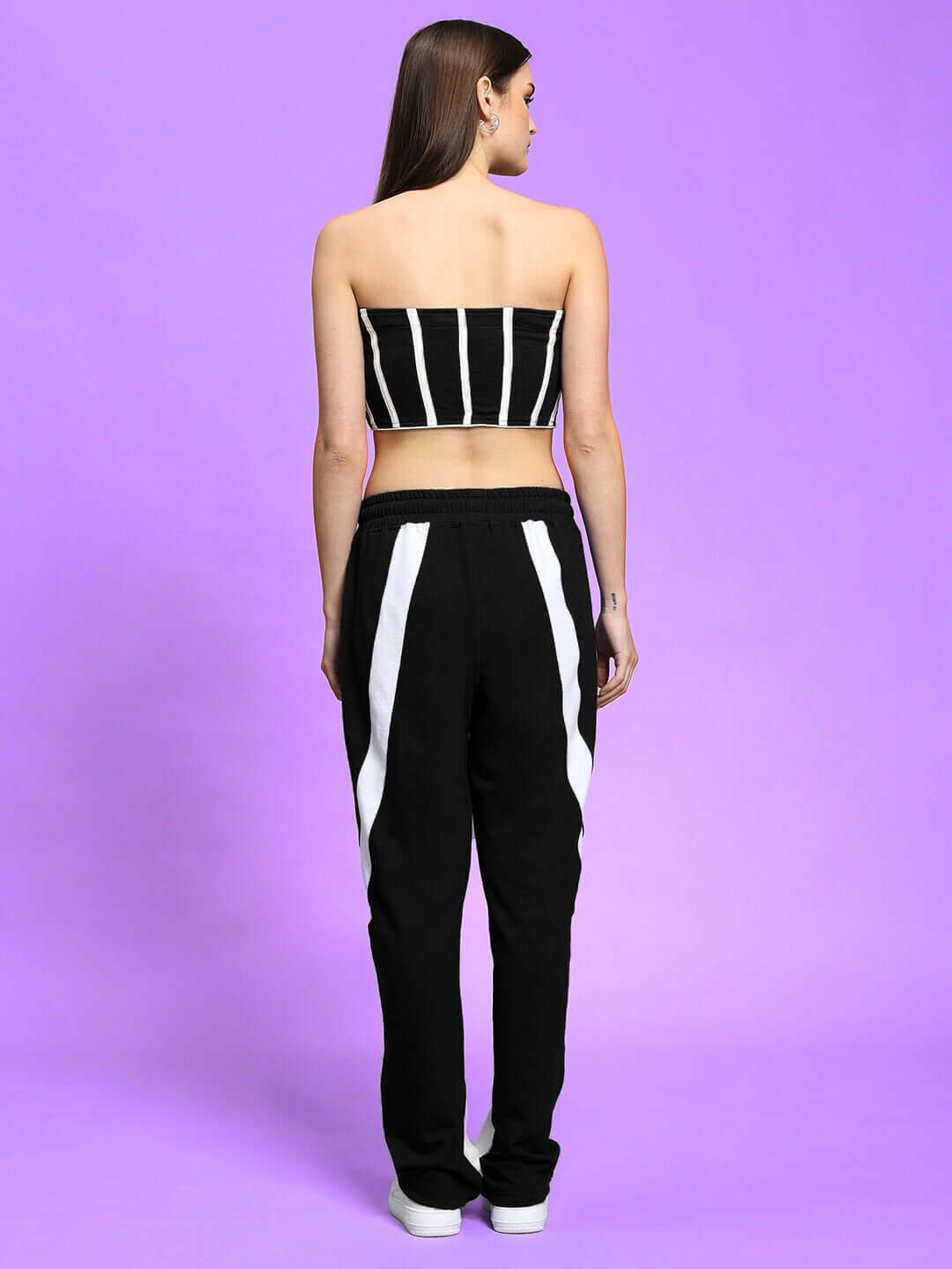 Back view of WOMEN'S LIVIANA COOL CO-ORD SET BLACK by WEAR DUDS, featuring a black and white striped crop top and pants.