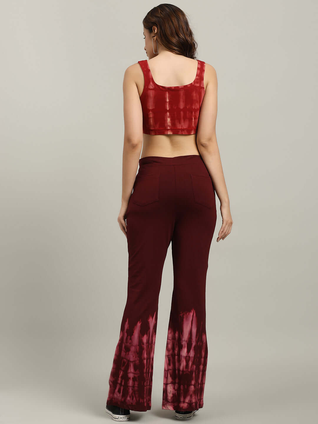 Back view of WOMEN'S MEMORIA TIE-DYE CO-ORD SET MAROON with crop-top and joggers, showcasing streetwear style and comfort.
