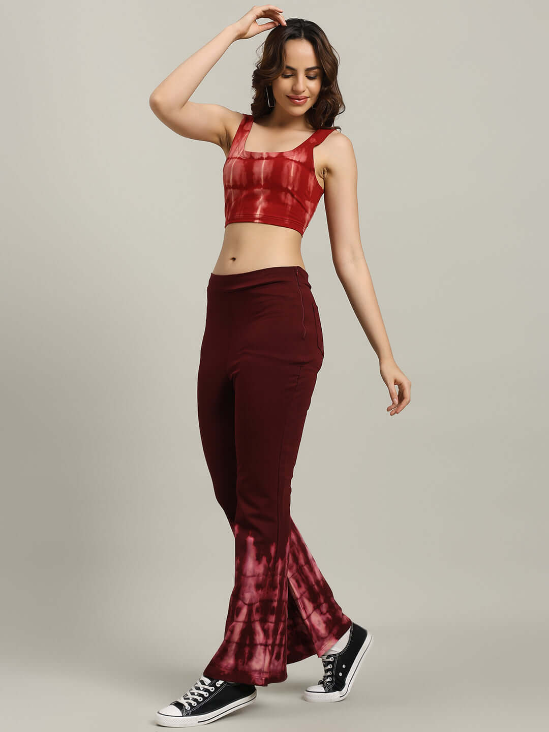 Model wearing WOMEN'S MEMORIA TIE-DYE CO-ORD SET MAROON with crop-top and joggers.