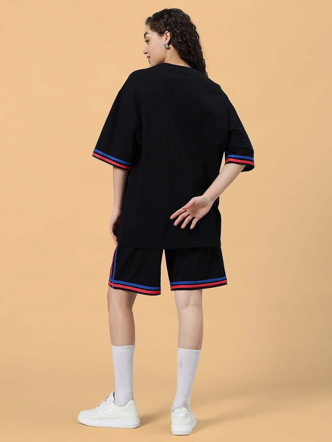 Back view of WOMEN'S MIAMI COLORBLOCK CO-ORD SET BLACK made from premium cotton French terry lycra, stylish and comfortable.