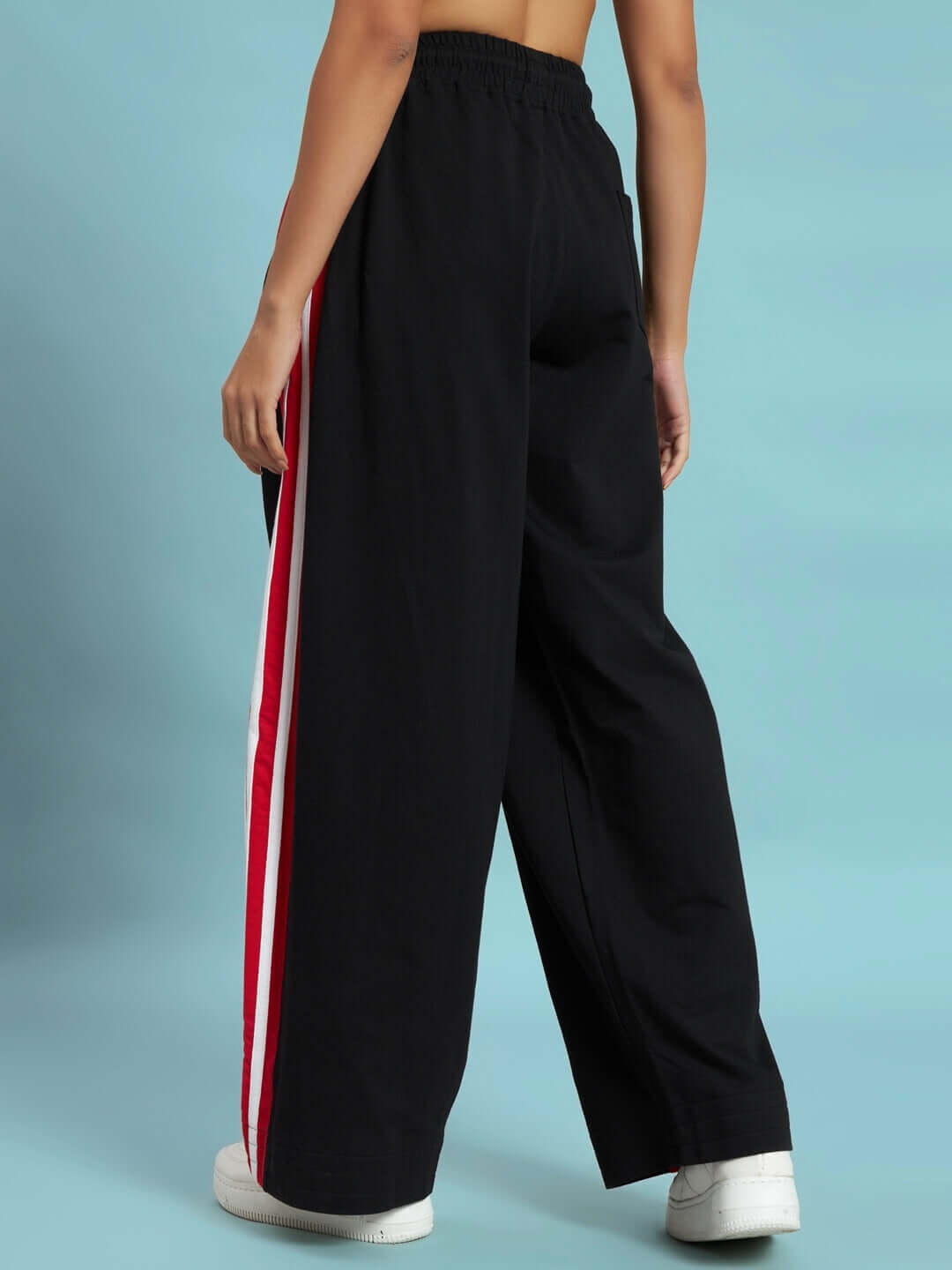 WOMEN'S MILANO RELAXED-FIT JOGGERS BLACK-RED Back view of women's Milano relaxed-fit joggers in black with red stripe detail, perfect for custom size selection.
