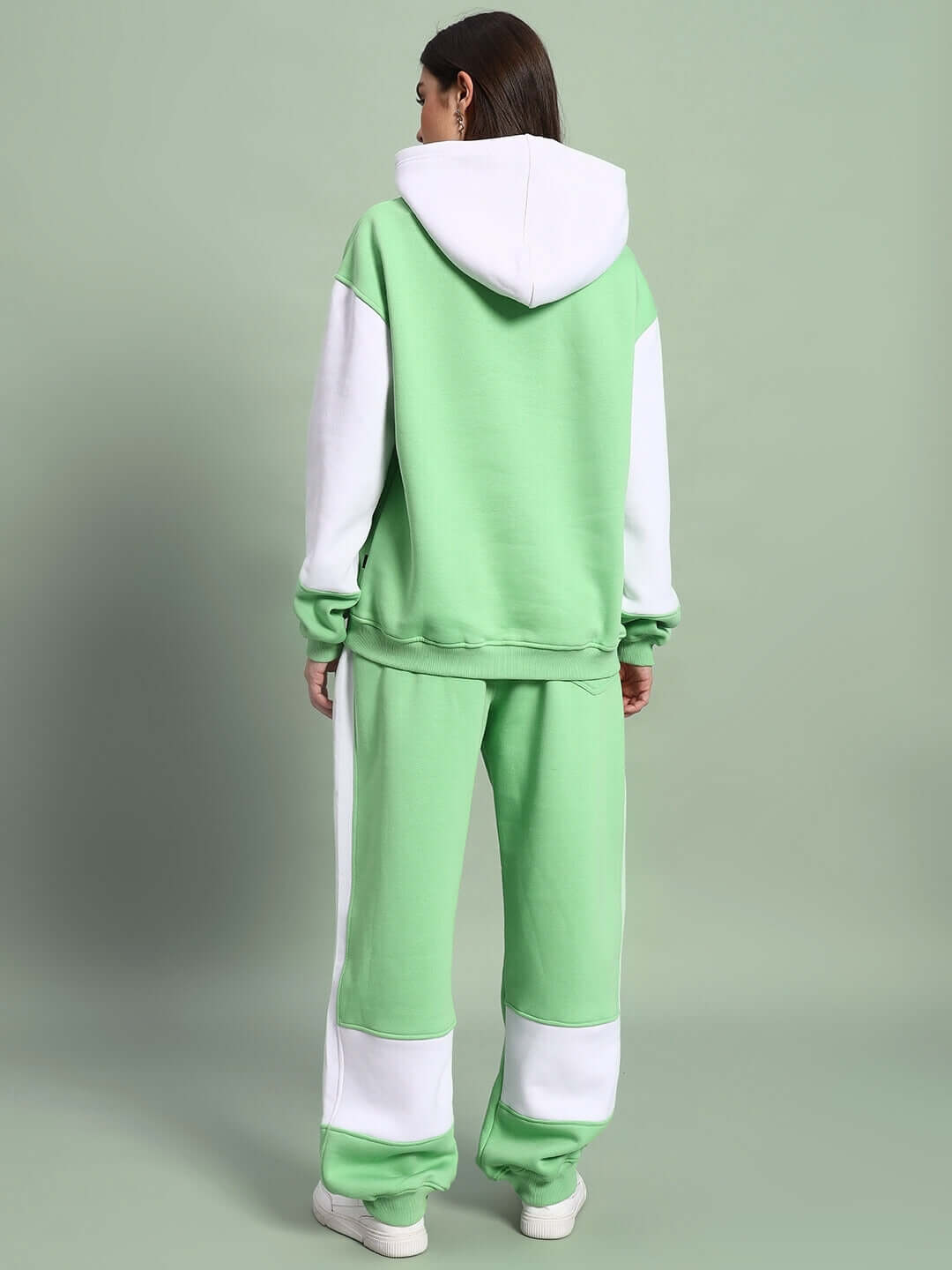 Back view of WOMEN MINTED BLISS FLEECE COLORBLOCK CO-ORD GREEN WHITE hoodie and joggers on model.